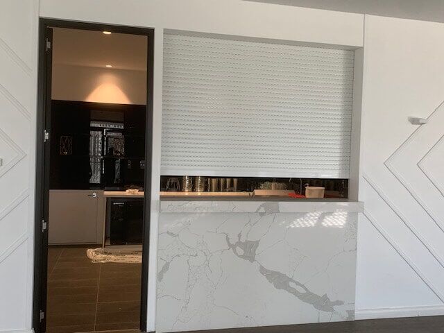 commercial security window shutters Bblackburn